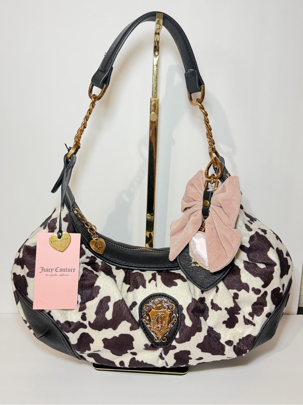 Juicy Couture Black & White Cow Print Shoulder Bag with Pink Bow Accent